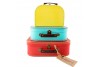 3 valises rétros aux couleurs vives
